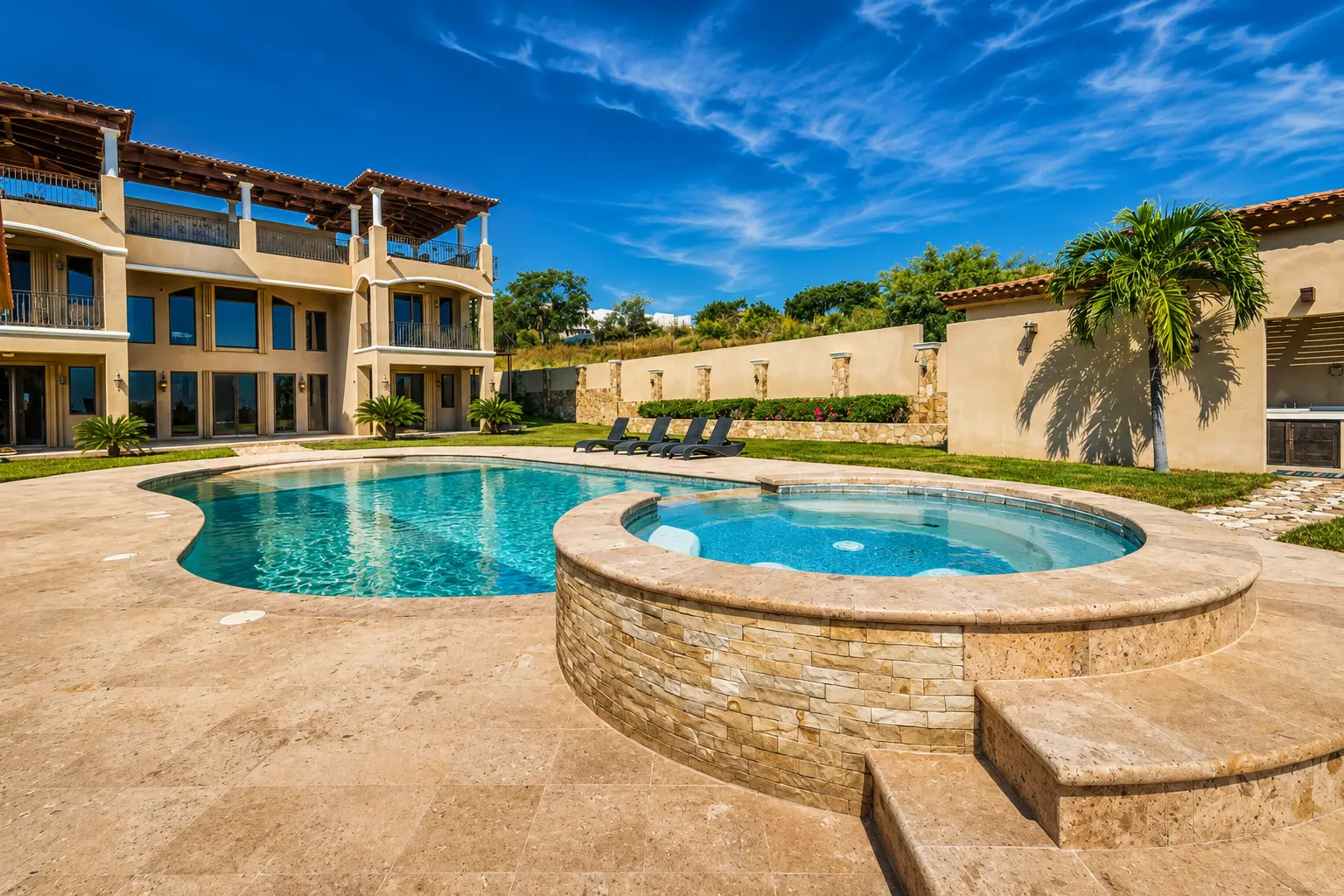 Pool & stone-clad jacuzzi