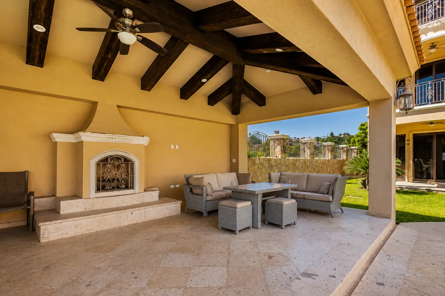 Covered palapa lounge with fireplace